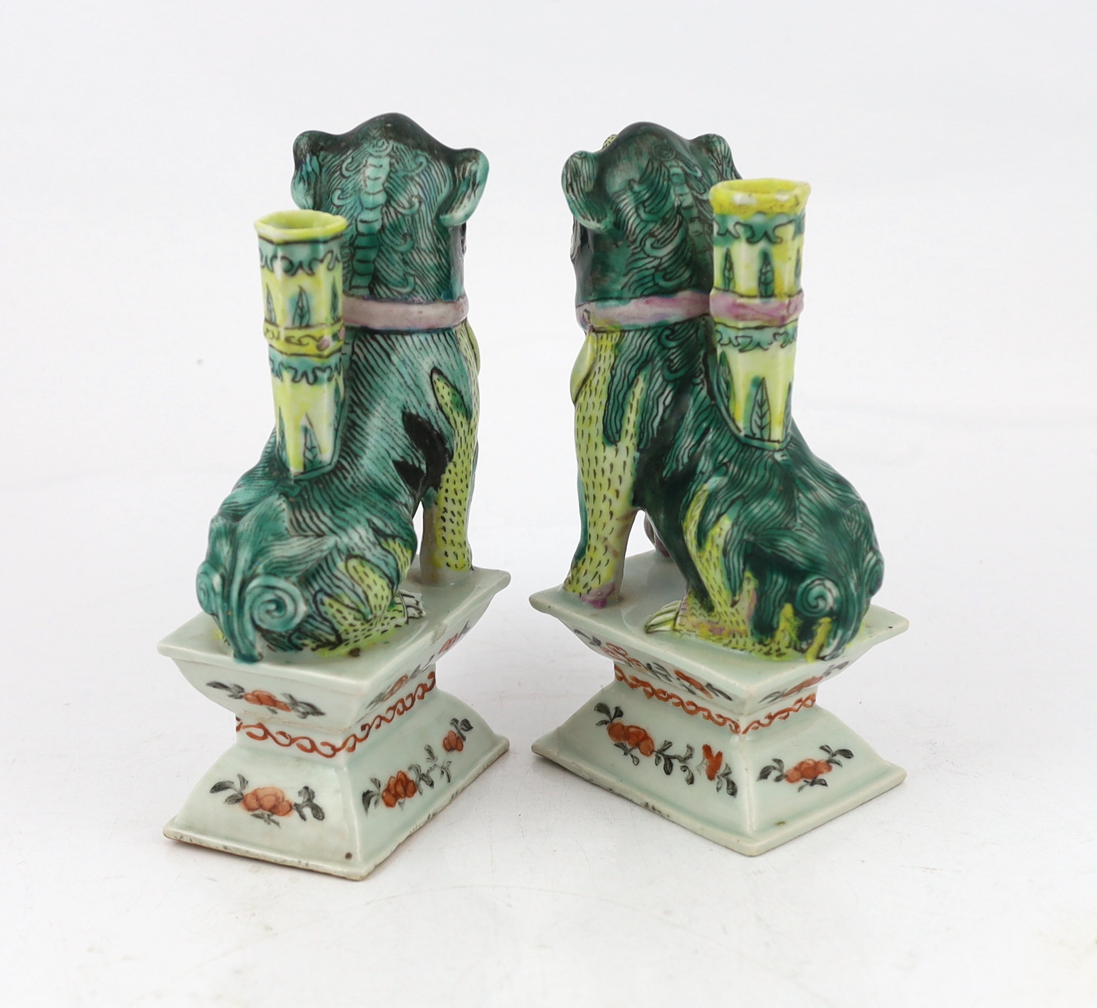 A pair of Chinese enamelled porcelain ‘Buddhist lion’ joss stick holders, early 19th century